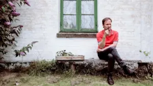Foredrag med Knud Romer